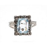 Attractive white gold aquamarine and diamond rectangular dress ring, the aquamarine 1.79ct, with a