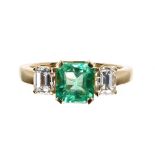 18ct square emerald and diamond three stone ring, emerald 1.47ct, diamonds 1.01ct