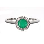 Modern 18ct emerald and diamond halo cluster ring, 8mm diameter, 1.9gm, ring size N