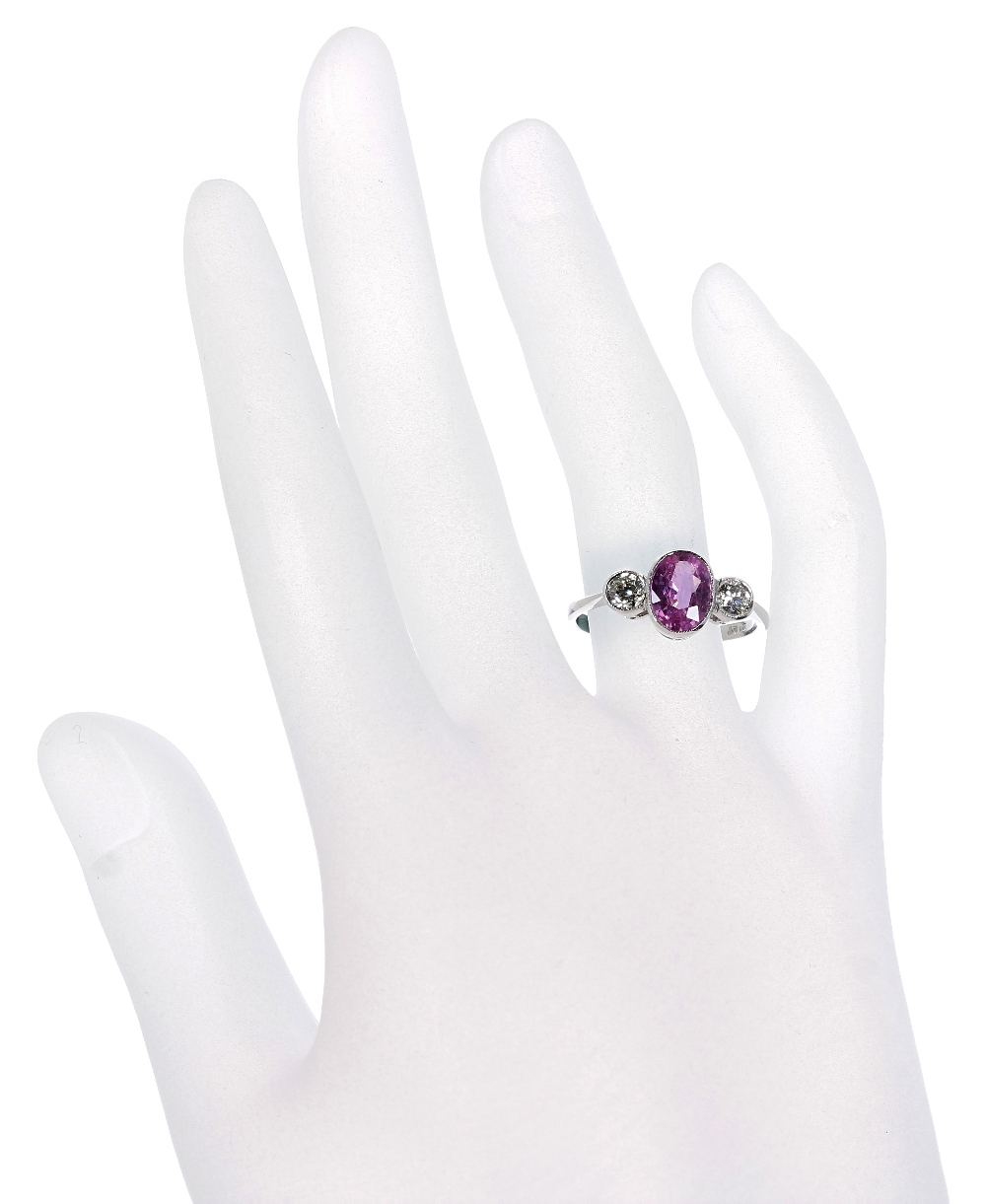 Platinum pink sapphire and diamond three stone ring