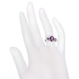 Platinum pink sapphire and diamond three stone ring