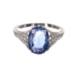 Fine antique platinum sapphire and diamond ring, the oval sapphire 3ct approx, millegrain diamond