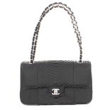 Chanel Classic double flap bag, black snakeskin, with Chanel Boutique sale invoice and