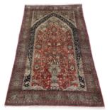 Kashmir red ground silk rug, 90" x 53" approx