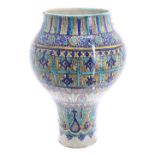 Large Eastern Iznik turquoise and blue glaze pottery vase, of inverted baluster form, decorated