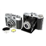 Zeiss Ikon Nettar camera; together with a Zeiss Ikon Contina camera with lens hood and filter (2)