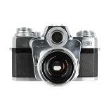 Zeiss Ikon Contarex 'Bullseye' camera, no. T93554, with Zeiss Planar 1:2 f=50mm lens no. 2369793,