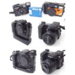Konica Minolta Dimage A1 digital camera; together with a Konica Dimage A2 digital camera, a Konica