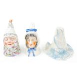 Three Royal Worcester porcelain candle snuffers; Mr and Mrs Caudle, and a feathered hat (3)