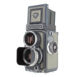 Rolleiflex Grey Baby, no. 2031442, with Xenar 1:3.5/60 lens no. 5547348 and lens hood