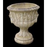 Decorative composite stone urn planter, with reeded decoration and lion mask ring handles, 22" d