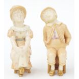 Pair of Royal Worcester blush ivory porcelain figures modelled as a seated boy and girl, factory