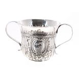 George III silver twin-handled porringer, with half reeded repousse decoration and rope twist