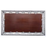 Late Victorian pierced silver framed mahogany tray, raised on four ball feet, maker William Comyns &