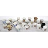 Collection of Commemorative porcelain and pottery cups, primarily for the 1911 Coronation, including