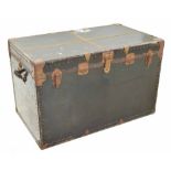 Very large late 19th/early 20th century flat top iron bound studded metal trunk, fitted with two