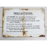 WWII enamel public notice sign 'Precautions. A W BOMBS fire instantly on breaking in air..., 12" x