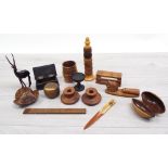 Small selection of carved novelty treen items including two Czech taps, napkin rings,