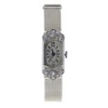Art Deco platinum diamond set lady's cocktail watch, rectangular silvered dial with Arabic
