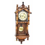 Unusual walnut small two train Vienna regulator wall clock, the 5" cream chapter ring enclosing a