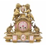 French ormolu and porcelain mounted two train mantel clock, the movement back plate stamped with the