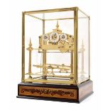Reproduction brass Congreve rolling ball clock, the central minute chapter ring with open centre,