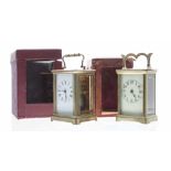 Two carriage clock timepieces in corniche brass cases, both 5.75" high and with outer Morocco