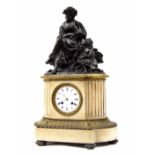 Good French white marble, ormolu and bronze figural two train mantel clock, the 4.25" white dial and