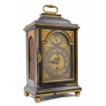 English ebonised single fusee verge bracket clock, the 6" brass arched dial with silvered chapter