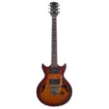 Gordon Smith Gypsy semi-hollow body electric guitar, made in England; Finish: amber burst, heavy