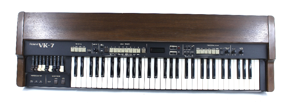 Roland VK-7 organ, made in Japan, ser. no. ZJ81566; together with a Quik-Lok dual keyboard stand