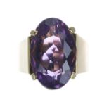 18k oval amethyst single stone ring, the amethyst 10.30ct approx, width 18mm, 6.1gm, ring size L
