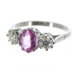 Good modern platinum pink sapphire and diamond three stone ring, the oval sapphire 1.50ct approx,