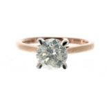 Platinum and 18k rose gold solitaire diamond ring, round brilliant-cut, 1.75ct approx, clarity I1/2,