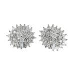 Pair of attractive modern 9k white gold oval diamond cluster earrings, round brilliant and