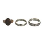 9ct signet ring, 1.8gm; 9ct gold and silver eternity ring, 2.8gm and a 9ct diamond eternity ring,