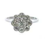 Platinum diamond daisy cluster ring, round brilliant-cut estimated 1.00ct approx, clarity VS2/SI,