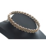 9ct gate link style bangle with safety chain, 15.4gm, width 67mm