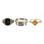9ct onyx gentleman's signet ring, 4.5gm; 9ct bicolour gentleman's ring, 2.7gm; also a 10k dress