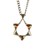 9ct open star pendant on a curb chain, 10.6gm, the chain 20" long