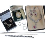 Silver stone set jewellery suite with white and red stones, comprising a necklet, pair of earrings