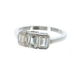 Fine platinum emerald-cut three stone diamond ring, 1.60ct approx, clarity VS2/SI, colour I-J, width