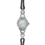 Vertex platinum and diamond lady's cocktail wristwatch, silvered dial with Arabic numerals and