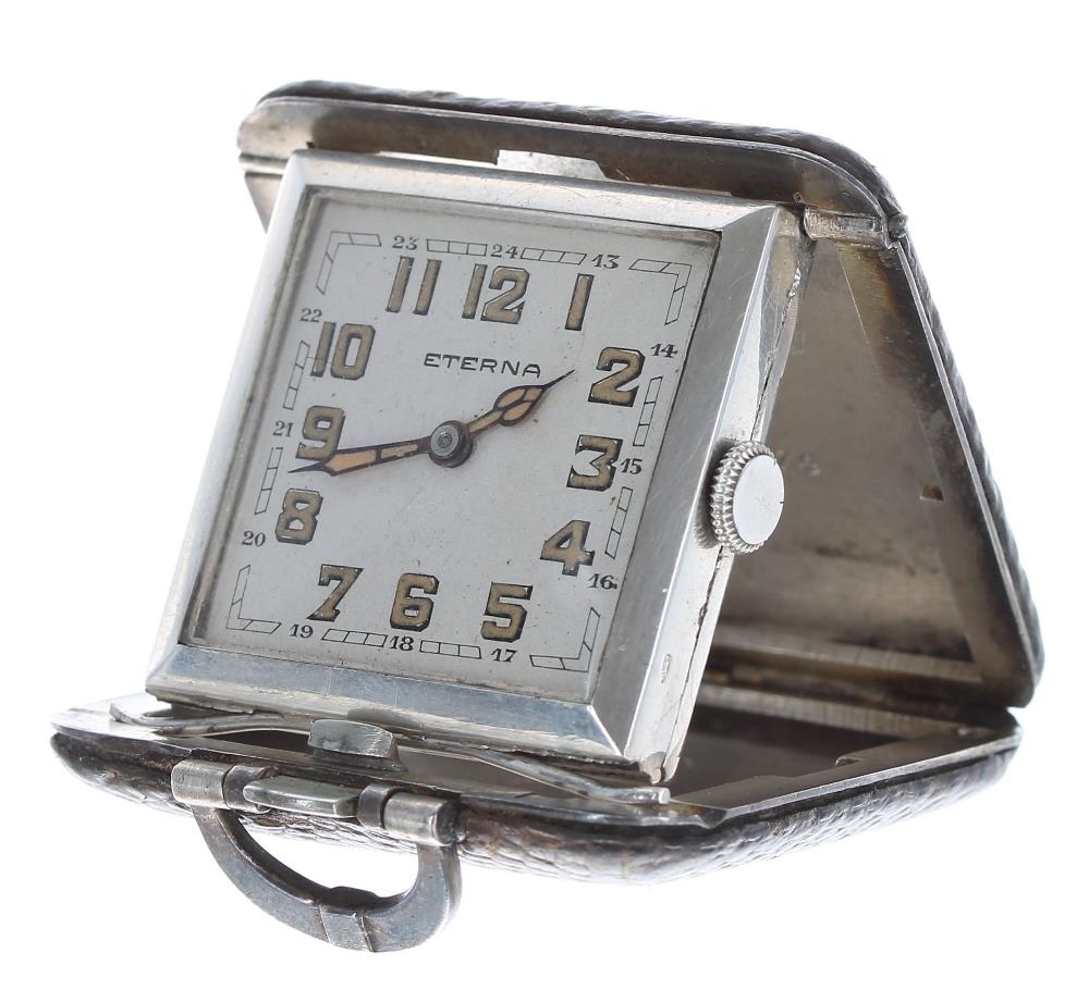 Art Deco Eterna silver leather bound square folding purse watch, signed square silvered dial with