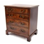 19th century mahogany chest of drawers of small proportions, the moulded top over four graduated