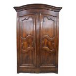 Good provincial French fruitwood armoire, the arched top over a pair of shaped panelled doors