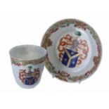 Chinese export armorial porcelain beaker and saucer, 18th century, the beaker 2.75" high, the saucer