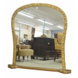 Large Victorian giltwood and gesso arch top overmantel mirror, with a moulded frame and shaped