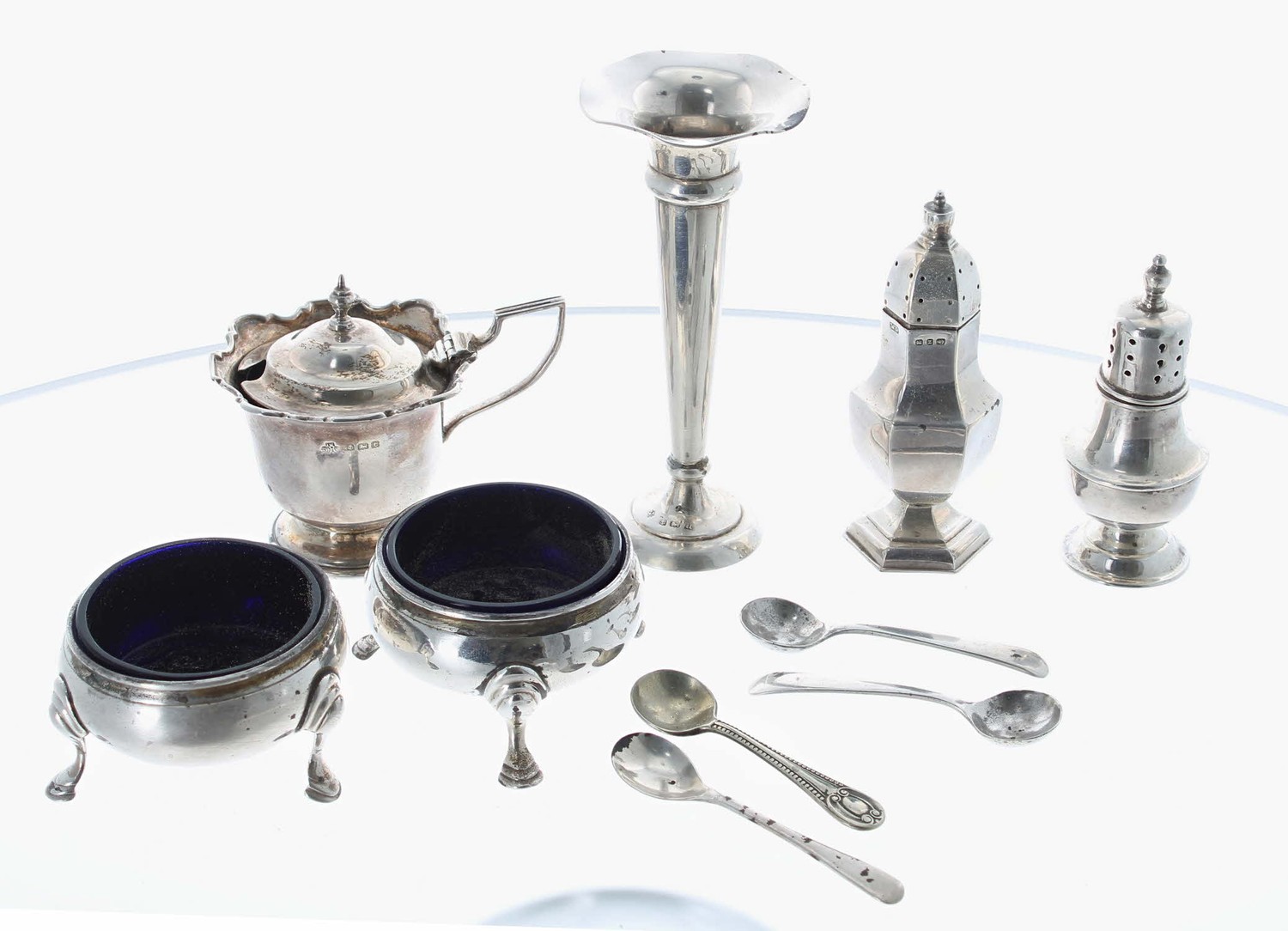 Small selection of silver items including a pair of Georgian salts with blue glass liners, George