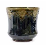 Royal Doulton stoneware glazed jardinière, the waisted shaped body with deep mottled green glaze and
